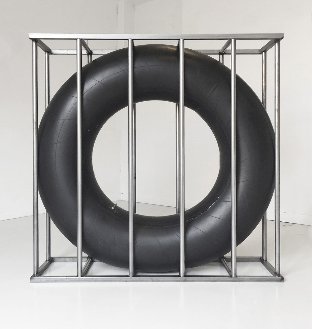 The Door Was Locked But He Forced an Entry (Phase I), 2015, steel, rubber inner-tube, cm. 147 x 147 x 41