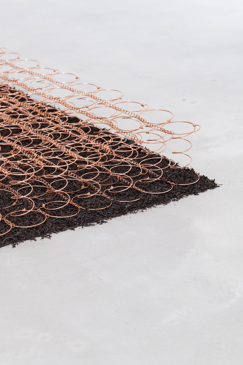 Tranquil, 2020, electroplated copper bed springs, black Ceylan tea, cm. 17 x 194 x 118