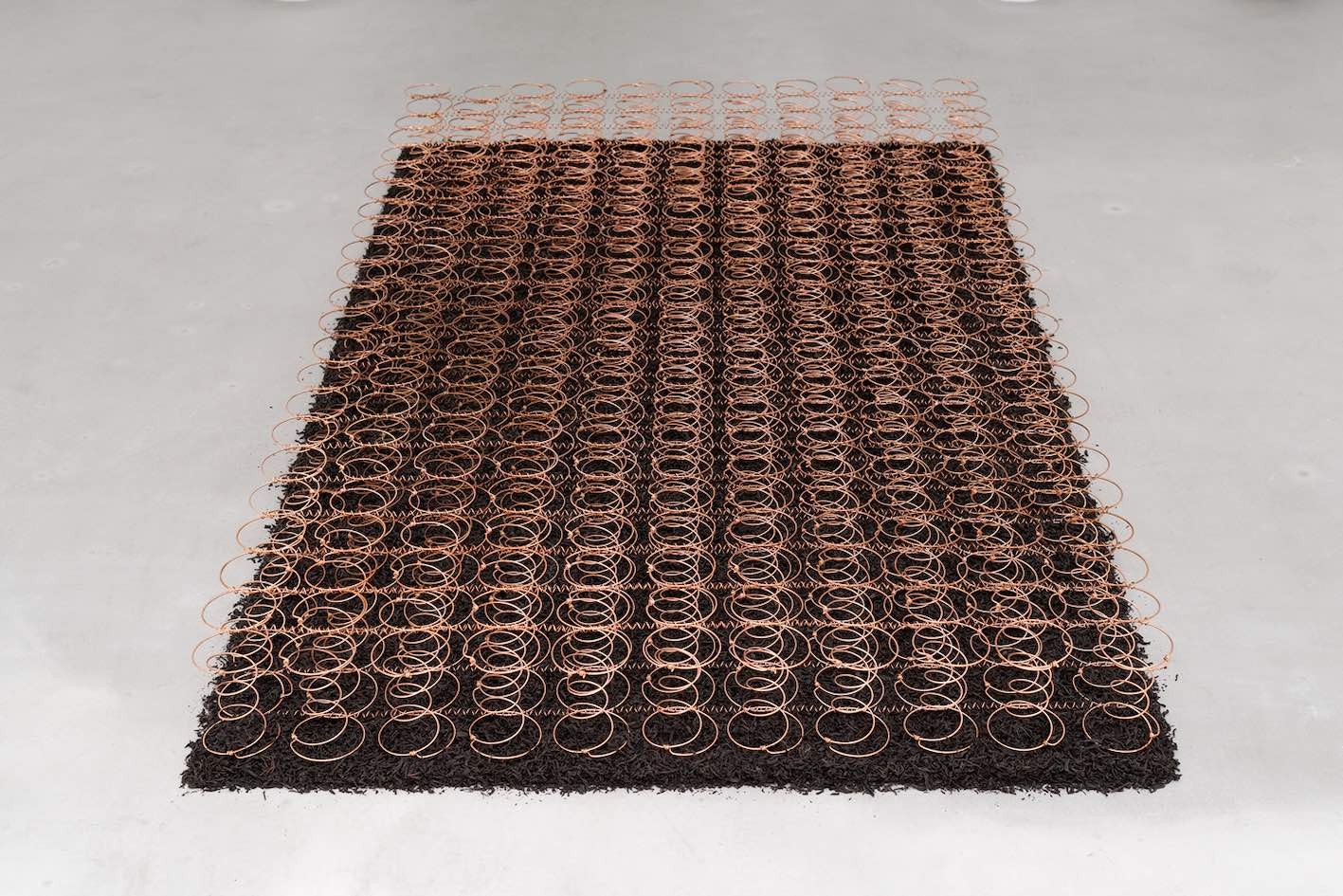 Tranquil, 2020, electroplated copper bed springs, black Ceylan tea, cm. 17 x 194 x 118